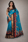 A graceful ethnic saree featuring a rich woven